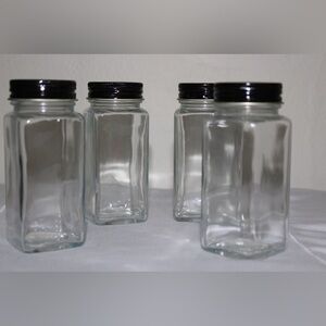 Glass seasoning bottles. Never used. Still in plastic wrap they came in.